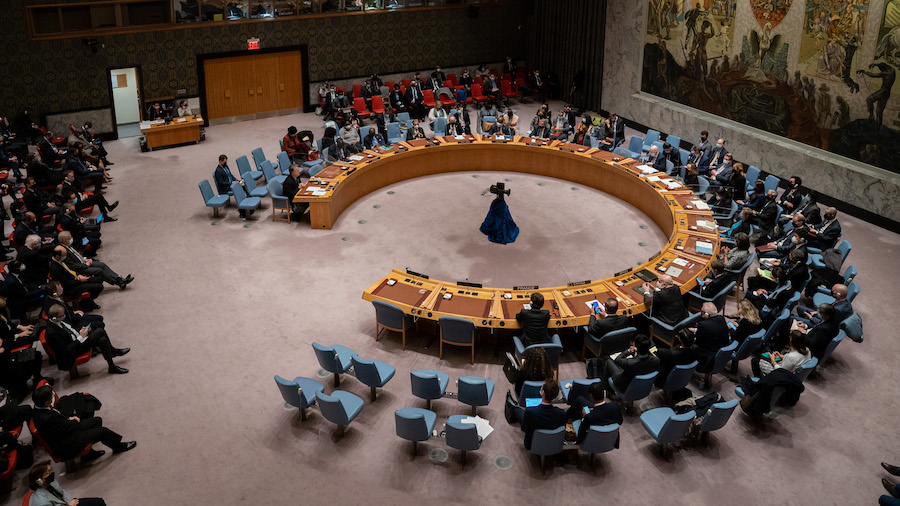 FILE: Members of the United Nations Security Council cast their votes during a meeting at United Na...