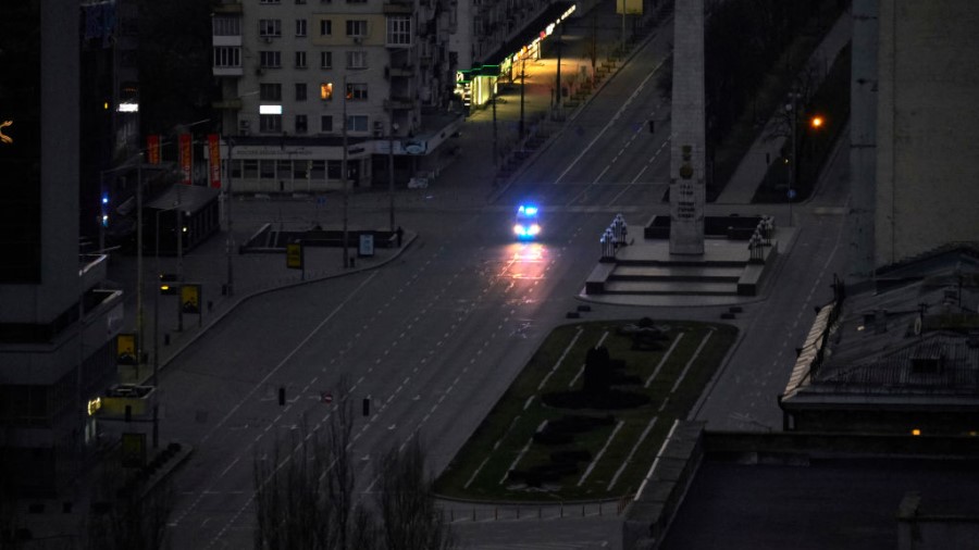 KYIV, UKRAINE - FEBRUARY 26: A police vehicle is seen patroling the streets as a curfew has been im...