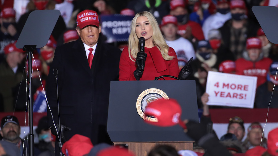 FILE: Former President Donald Trump listens as his daughter Ivanka Trump speaks during a campaign r...