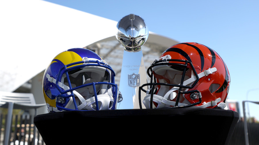 Helmets of the Los Angeles Rams and Cincinnati Bengals sit in front of the Lombardi Trophy before N...