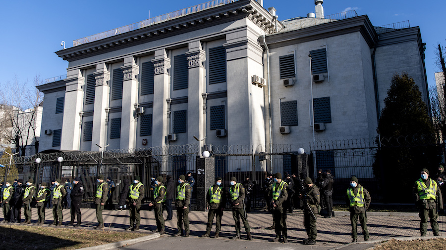 Police stand guard outside the Russian Embassy during a protest on February 22, 2022 in Kyiv, Ukrai...