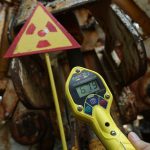 PRIPYAT, UKRAINE - AUGUST 18:  A Geiger counter shows a reading of 679,000 counts per minute near a metal claw contaminated with radioactivity in the ghost town of Pripyat not far from the Chernobyl nuclear power plant on August 18, 2017 in Pripyat, Ukraine. On April 26, 1986 reactor number four exploded after a safety test went wrong, spreading radiation over thousands of square kilometers in different directions. The nearby town of Pripyat, which had a population of approxiamtely 40,000 and housed the plant workers and their families, was evacuated and has been abandoned ever since. Today tourists often visit the town on specially-organized tours from Kiev.  (Photo by Sean Gallup/Getty Images)
