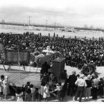 In April 1943, thousands of Topaz prisoners turned out for the funeral of the 63-year-old James Wakasa. Wakasa had been shot by the military police for walking with his dog too close to the camp's barbed wire perimeter.
(Utah State Historical Society)