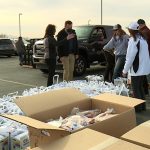 Dozens of volunteers helped Farmers Feeding Utah distribute tons of food to National Guard families in Layton on Monday (KSL TV)