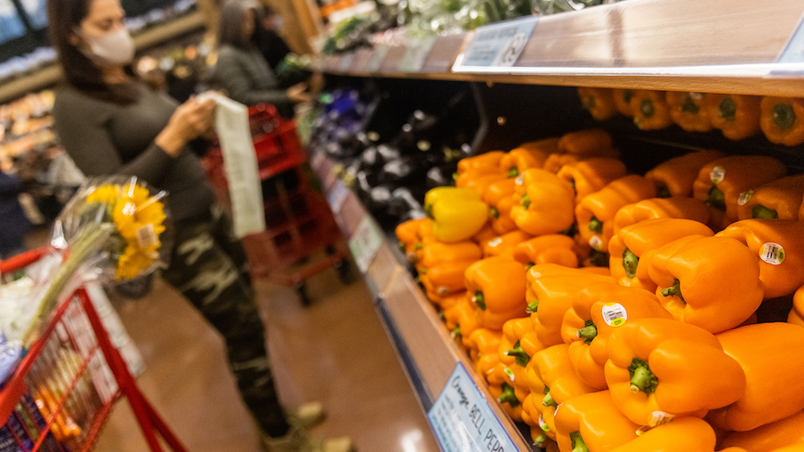 Don't expect grocery store prices to come down anytime soon. Pictured is a Trader Joe's grocery sto...