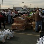 Dozens of volunteers helped Farmers Feeding Utah distribute tons of food to National Guard families in Layton on Monday (KSL TV)