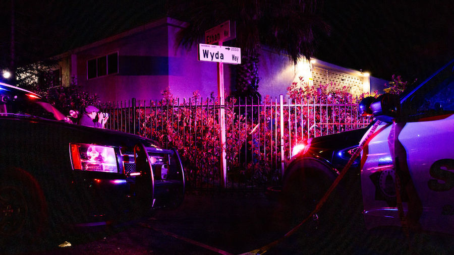 Police officers investigate the scene of a shooting at The Church in Sacramento on February 28, 202...