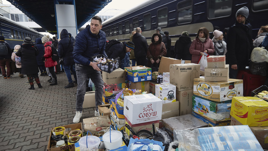 Volunteers store products and food at the train station on March 1, 2022 in Kyiv, Ukraine. The food...