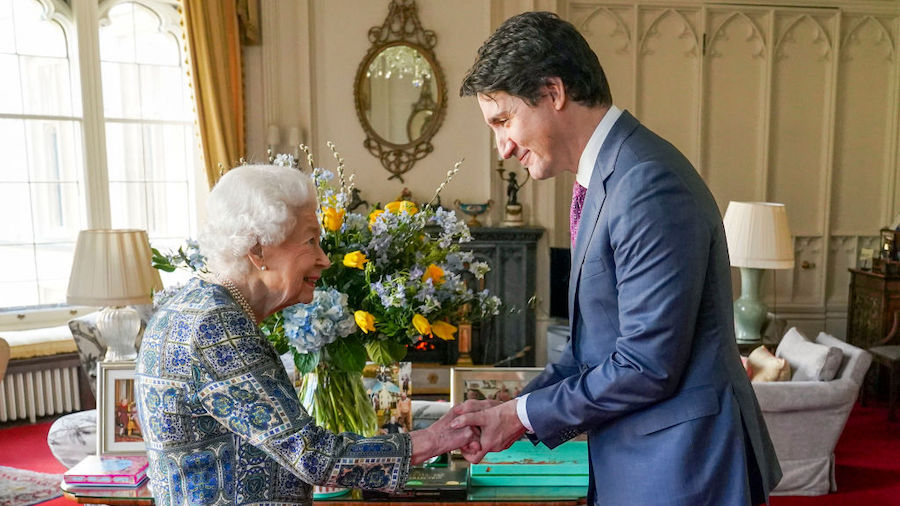 Queen Elizabeth II receives Canadian Prime Minister Justin Trudeau during an audience at Windsor Ca...
