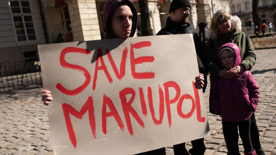 Ukrainians take part in an action in support of the residents and defenders of Mariupol on March 19...