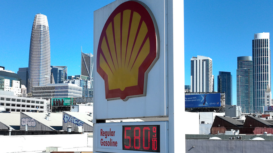 In an aerial view, gas prices nearing $6.00 a gallon are displayed at a Shell gas station on Februa...