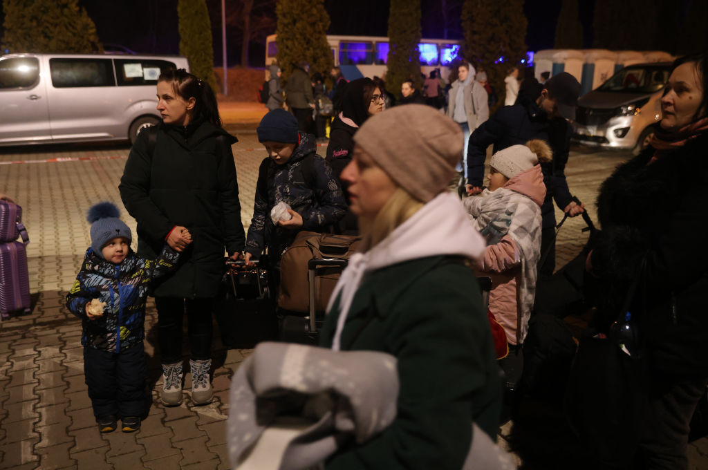 KORCZOWA, POLAND - FEBRUARY 28: Women and children refugees from Ukraine arrive at a temporary shel...