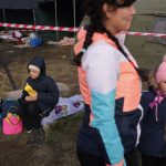 HREBENNE, POLAND - MARCH 1: A woman and children who had just arrived from war-torn Ukraine wait for relatives living abroad top pick them up at a border crossing to Ukraine on March 1, 2022 near Hrebenne, Poland. According to the United Nations, Poland has so far received 281,000 refugees from Ukraine since Russia invaded on February 24. Meanwhile, battles are raging across Ukraine between Ukrainian armed forces and the invading Russian army. (Photo by Sean Gallup/Getty Images)