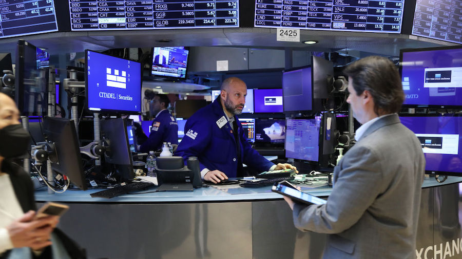 Traders work on the floor of the New York Stock Exchange (NYSE) on March 08, 2022 in New York City....
