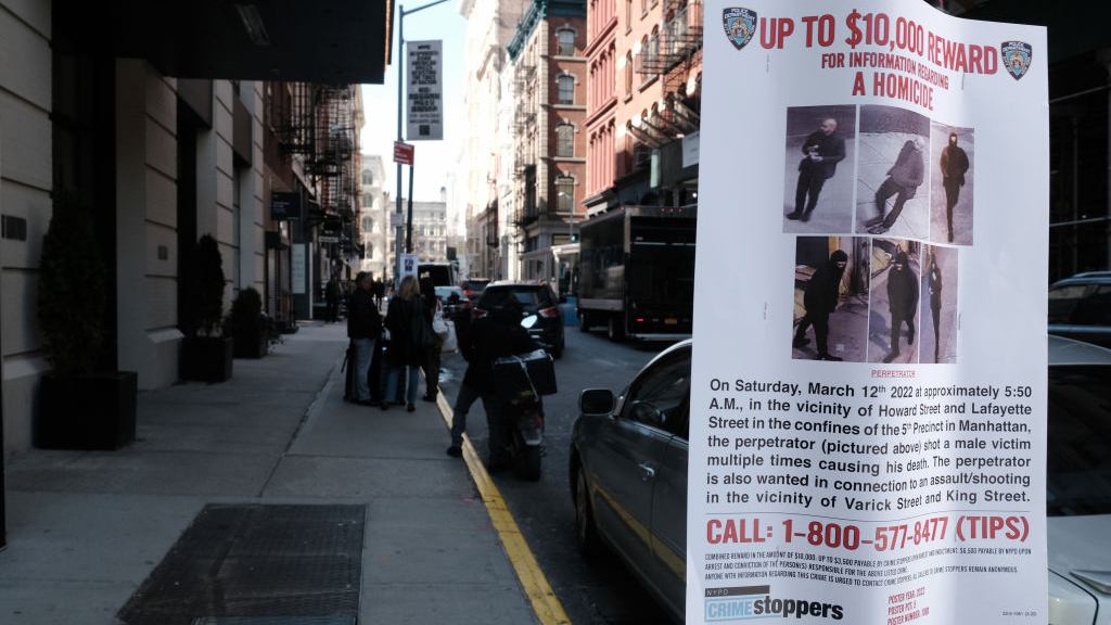 NEW YORK, NEW YORK - MARCH 14: Police posters are placed along a street where a homeless man was re...