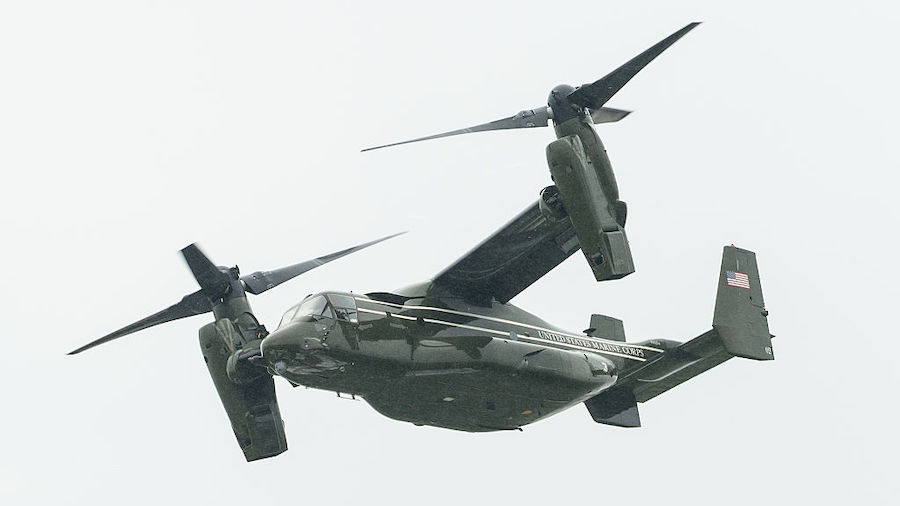 FILE IMAGE - A US Marine Corps Osprey helicopter flies behind as Marine 1 departs Windsor Castle on...