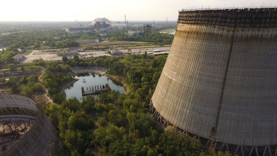 FILE: In this aerial view two partially-constructed and abandoned cooling towers stand as the new e...