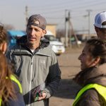 Brian Grow from Utah group of humanitarian volunteers in Moldova Coordinating with local volunteers.