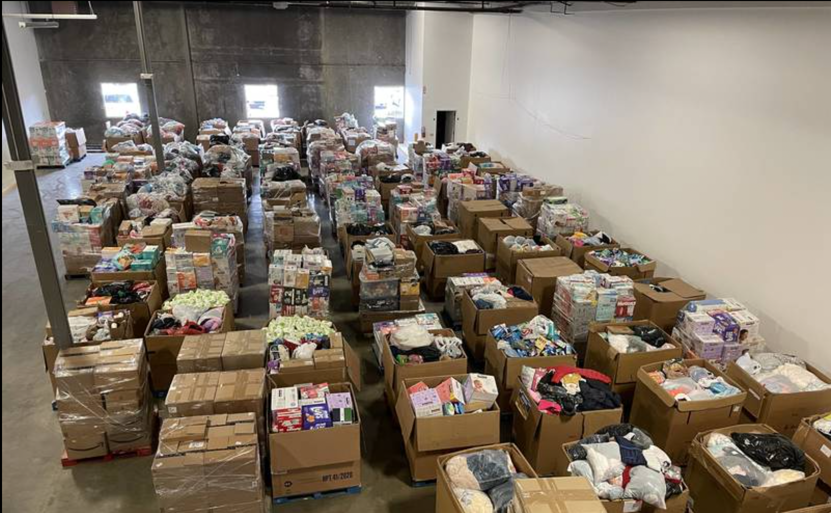 Driven to Assist Utah for Ukraine donations ready for sorting at the Utah Food Bank on March 16, 20...