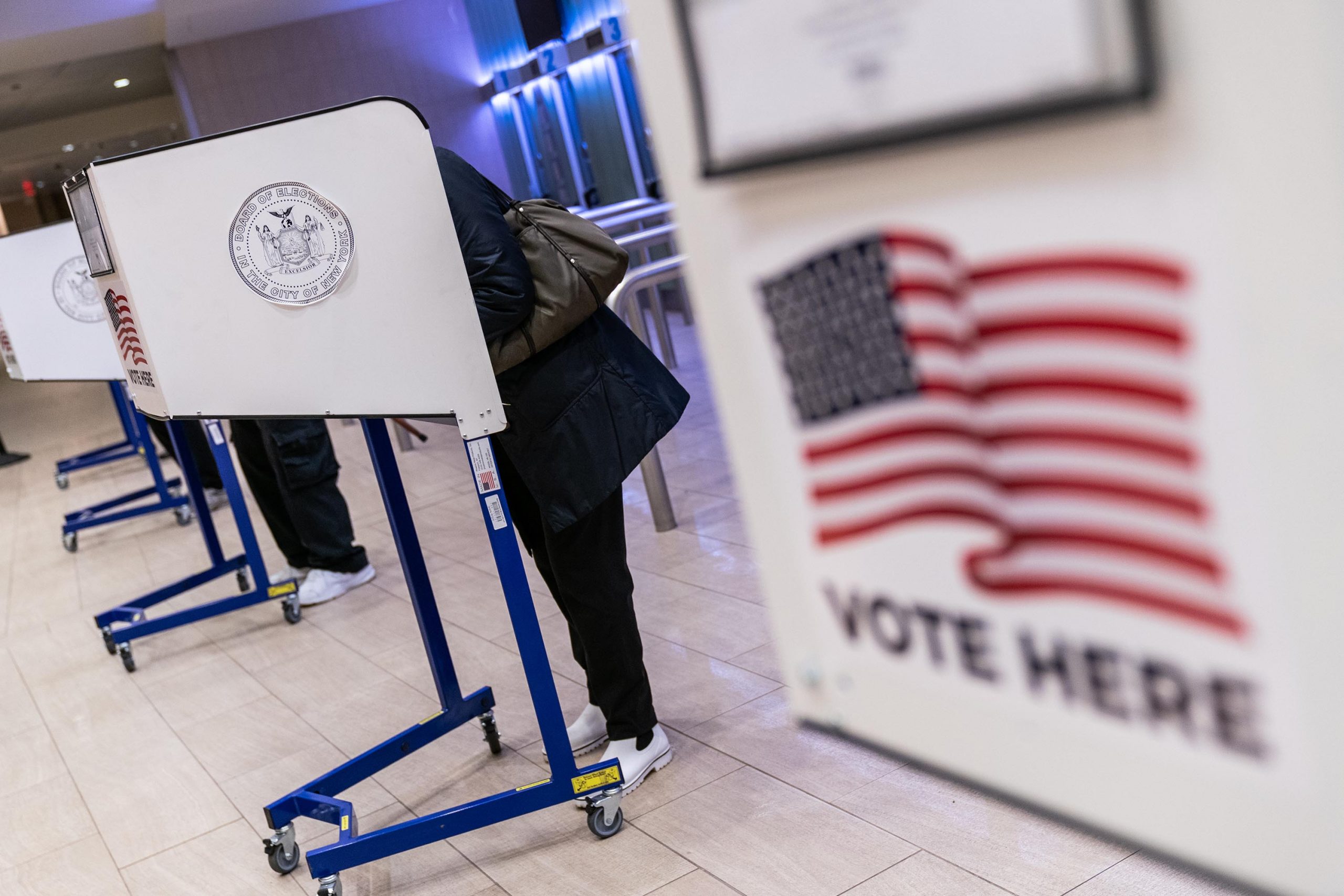 Voters cast ballots at an early voting polling location for the 2020 Presidential election at Madis...