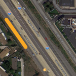 The orange line on the left side of the image indicates the distance between the vehicle impact and where the construction crew was working 224 feet to the south. The orange caution markers indicate closed lanes. All lanes but the one closest to the freeway median were closed at the time.