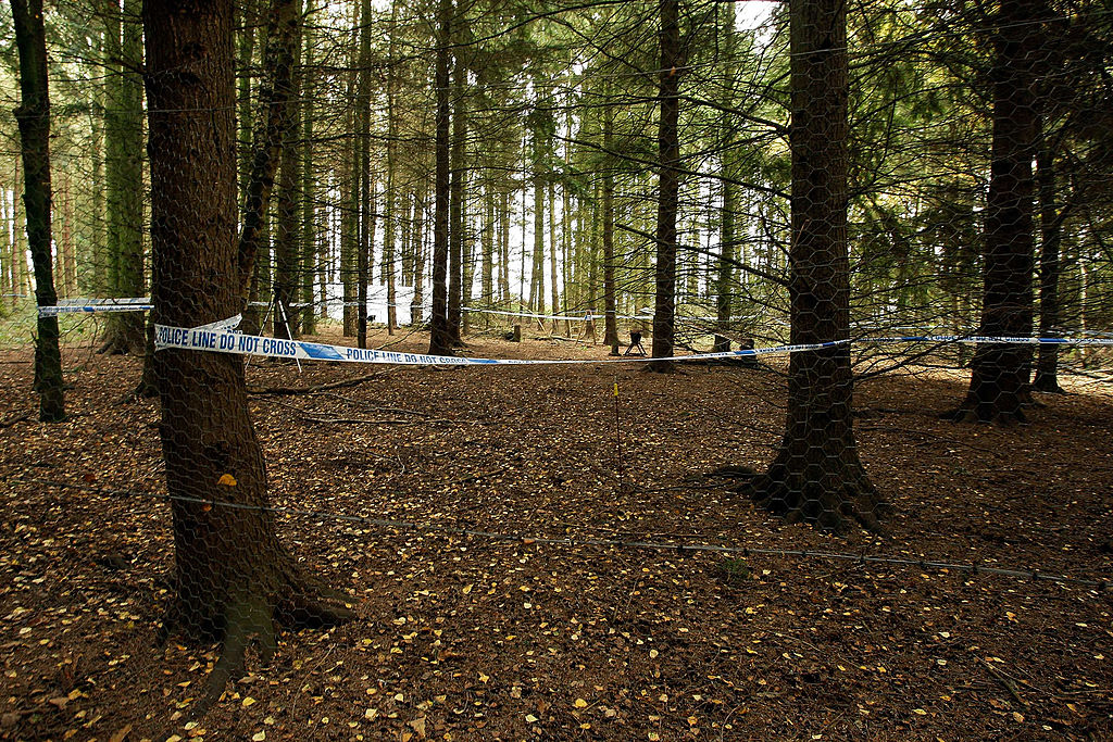 LEDBURY, ENGLAND - NOVEMBER 18:  A police cordon encloses a clearing as police search woods at Redh...