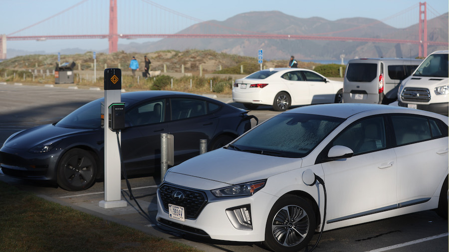 Electric vehicles recharge their batteries at the East Crissy Field charge station on March 09, 202...