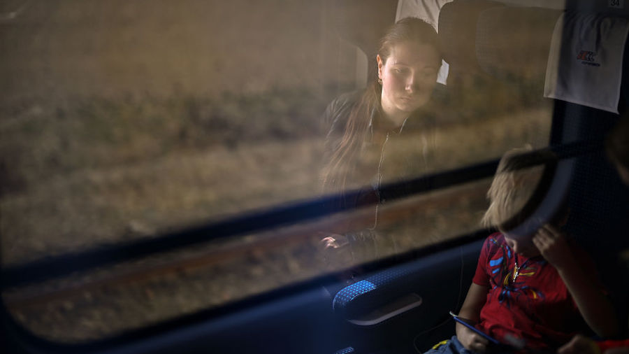 Refugee Vlada and her son Bogdan from Mariupol fleeing war torn Ukraine take a train from Przemysl ...