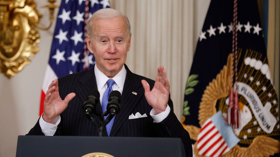 U.S. President Joe Biden delivers remarks before signing the Postal Service Reform Act into law dur...