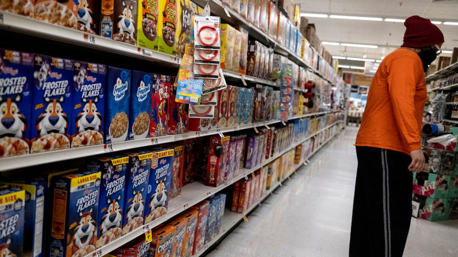 A person shops in the cereal aisle of a Giant Food supermarket on April 12, 2022 in North Bethesda,...