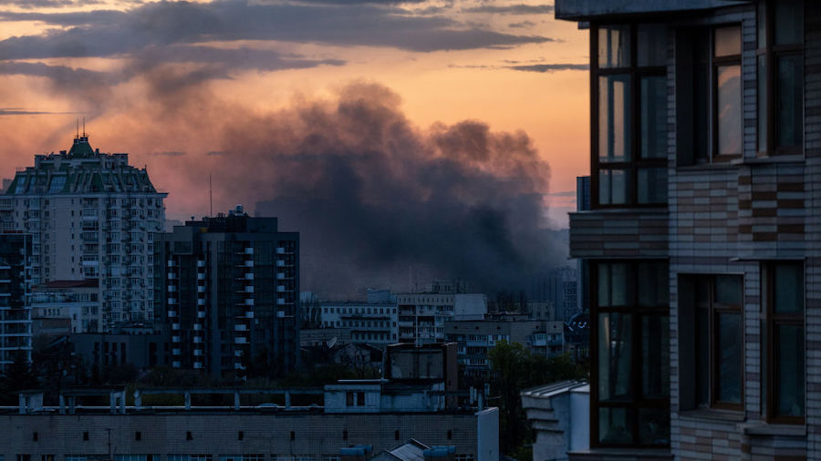 Smoke rises after missiles landed at sunset on April 28, 2022 in Kyiv, Ukraine. The mayor of Kyiv, ...