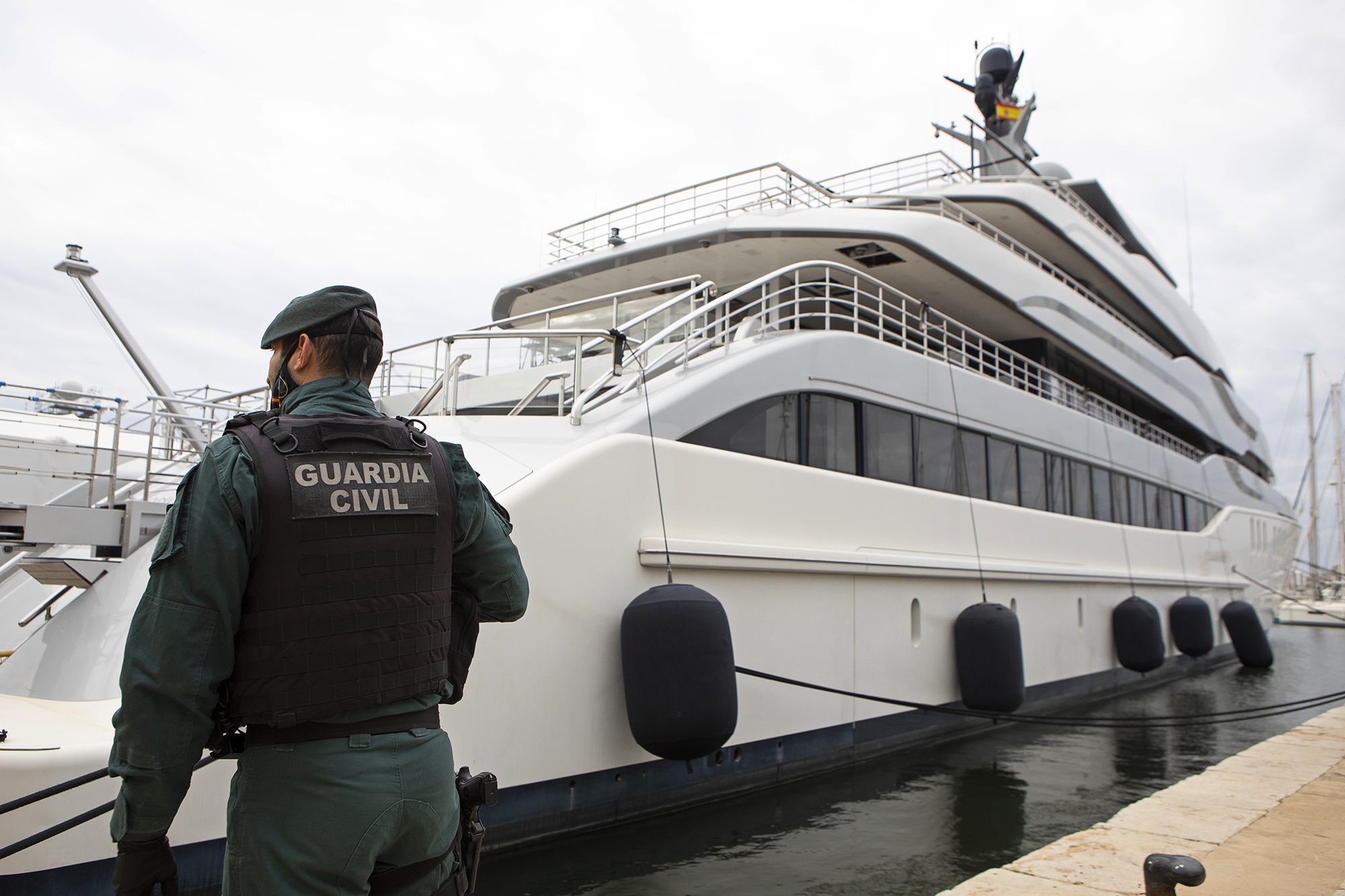 A Civil Guard stands by the yacht called Tango in Palma de Mallorca, Spain, Monday April 4, 2022. U...