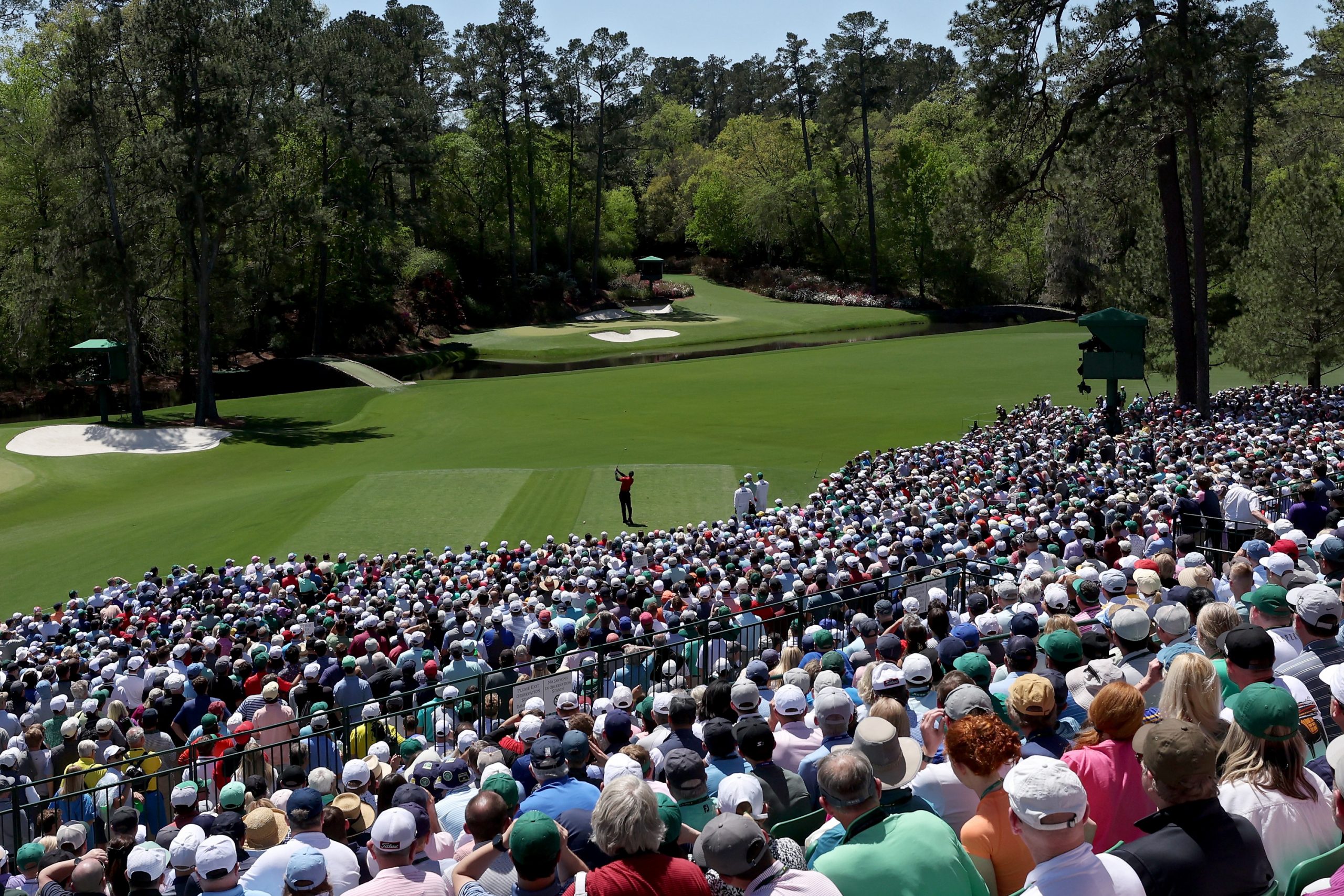 AUGUSTA, GEORGIA - APRIL 10: Tiger Woods plays his shot from the 12th tee during the final round of...
