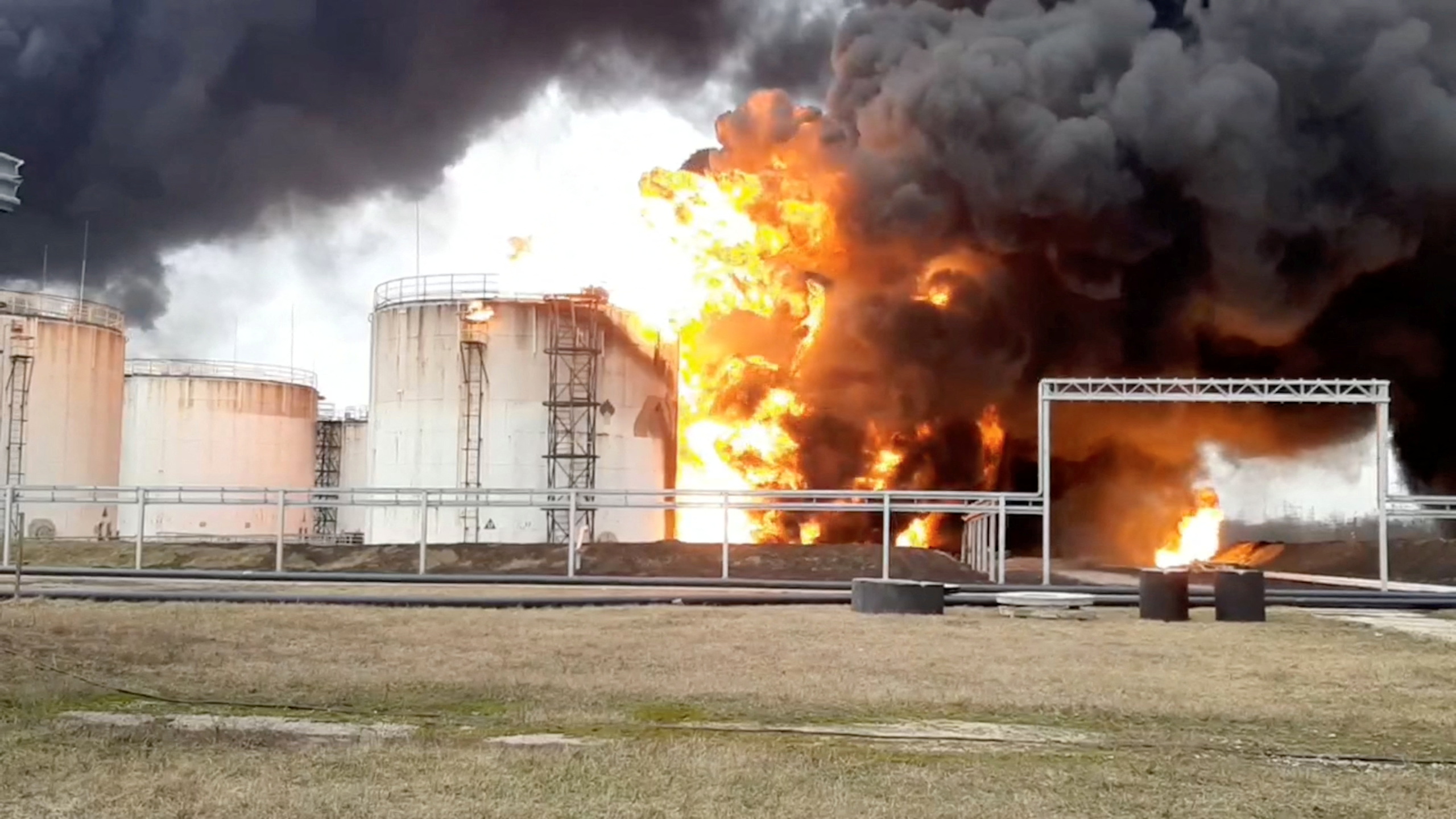 A still image taken from video footage shows a fuel depot on fire in the city of Belgorod, Russia A...