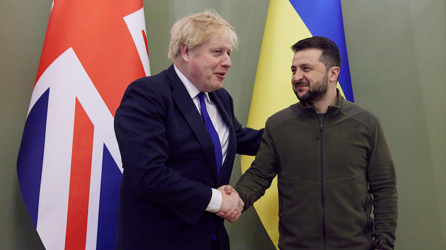 Ukrainian President Volodymyr Zelensky and Britain's Prime Minister Boris Johnson shake hands durin...