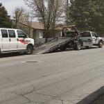 The suspect Uhal being towed by police. (Meghan Thackery, KSL TV)