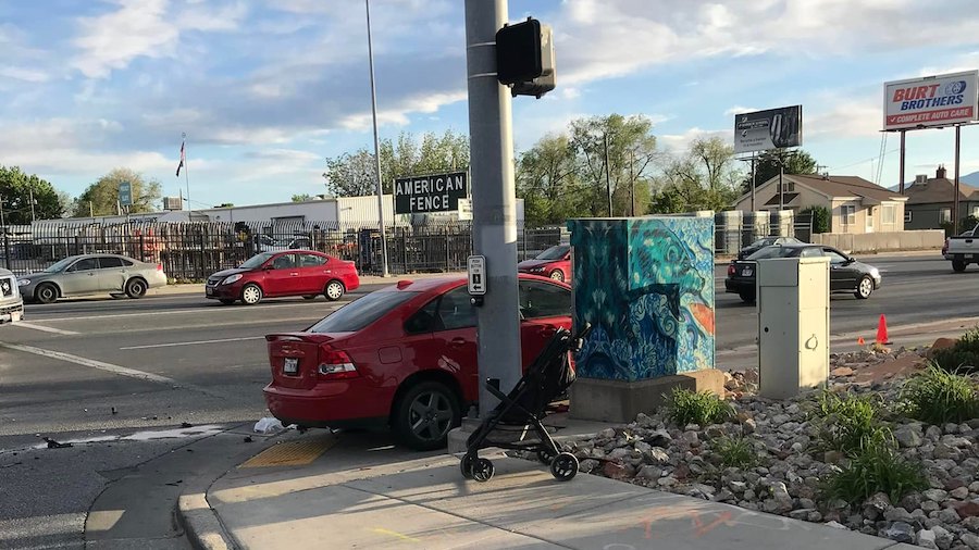 Two adults, one infant struck by car after collision in Salt Lake Co. intersection