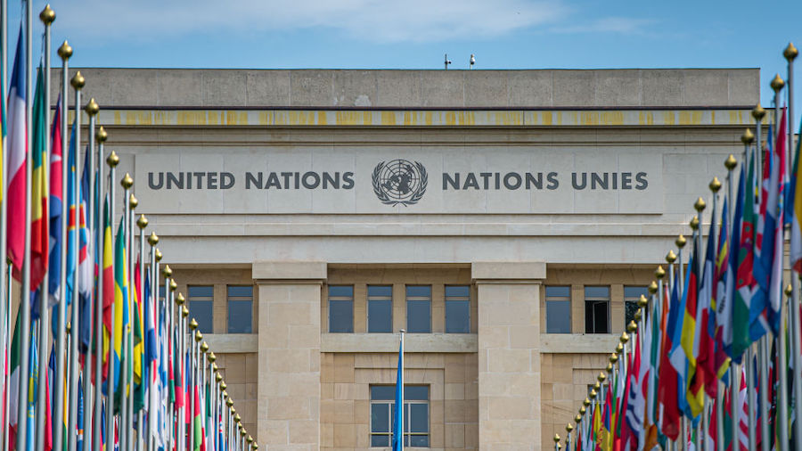 Flags stand outside the United Nations (UN) building in Geneva, Switzerland, on May 3, 2022 in Gene...