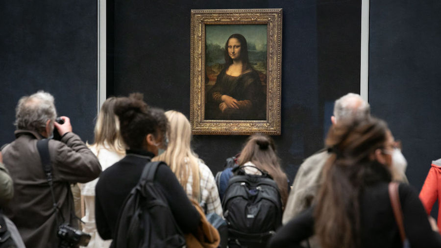 FILE: Visitors observe the painting 'La Joconde' The Mona Lisa by Italian artist Leonardo Da Vinci ...