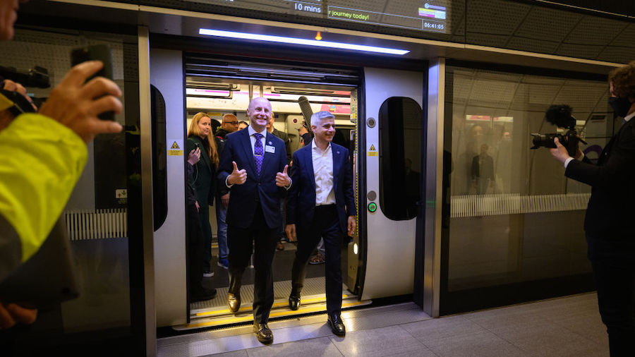 Mayor of London Sadiq Khan (R) and TfL Commissioner Andy Byford disembark after travelling on the f...