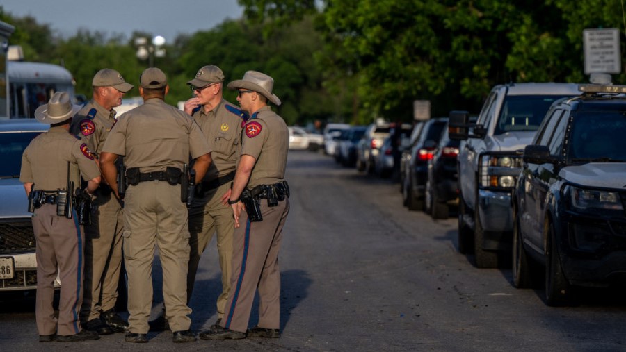 UVALDE, TEXAS - MAY 25: Law enforcement officers gather outside of Robb Elementary School following...