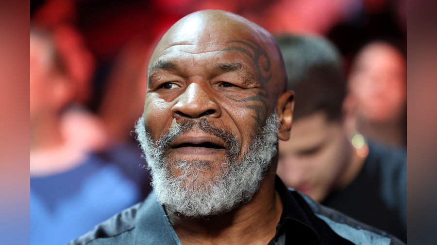 Former boxer Mike Tyson attends the junior welterweight bout between Montana Love and Gabriel Golla...