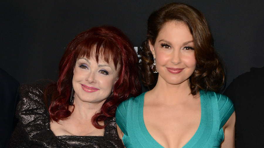 Naomi Judd (left), seen here in March 2013 in Los Angeles, died of a self-inflicted firearm wound, ...