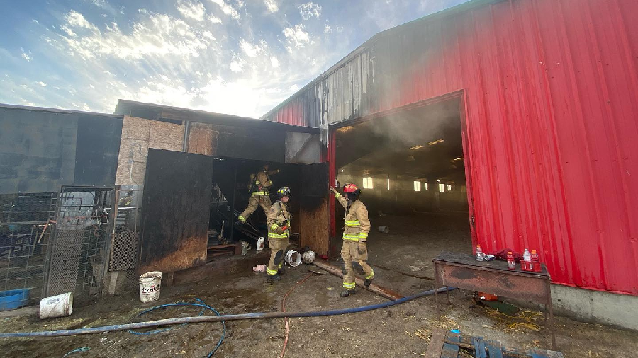 Crews cleaning up after the shed and barn fire in Provo. (Credit: Provo Fire & Rescue)...