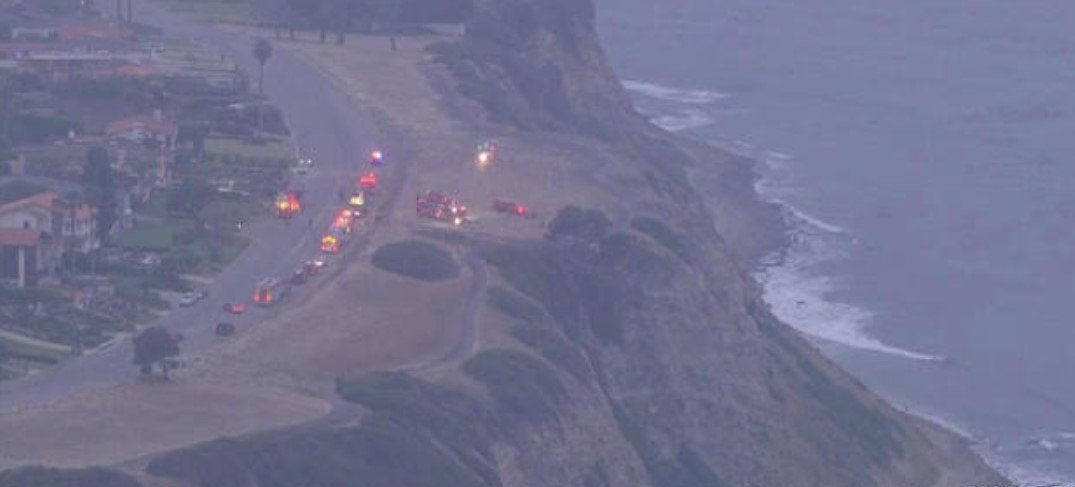 One person is dead and three others injured Monday after falling down a cliff in the Palos Verdes E...