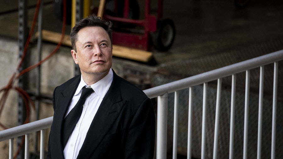 Elon Musk, chief executive officer of Tesla Inc., departs from court for the SolarCity trial in Wil...