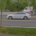 Possible suspect car that is white, two-door Honda passenger car with dark tinted windows. (Credit: SLCPD)