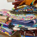 A pile of beautiful quilts nearly filled a spare room in the Halladay's home. (KSL TV)