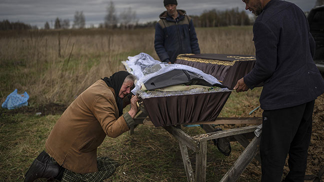 Mourning mass graves Ukraine...