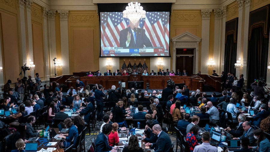 A video of former U.S. President Donald Trump is shown on a screen during the second hearing held b...